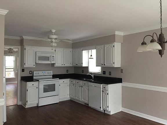 Kitchen with new granite counter top, new faucet, new range,