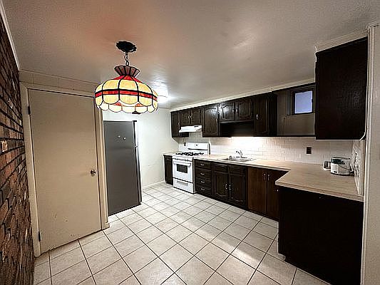 4th image of 63-50 79th St #1A