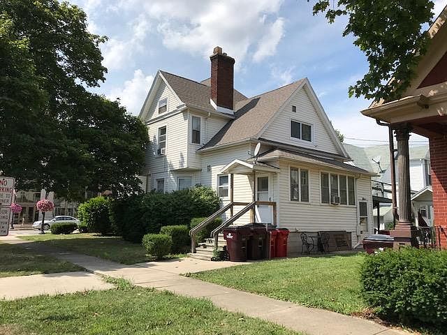 East view of house. Window at top is a kitchen window.