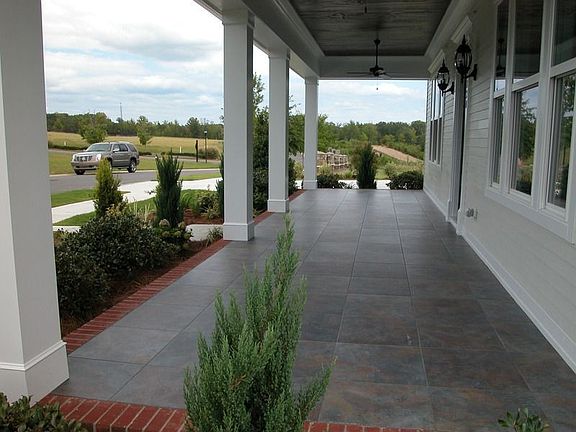 Spacious Front Porch with View of Walking Trail in the distamce