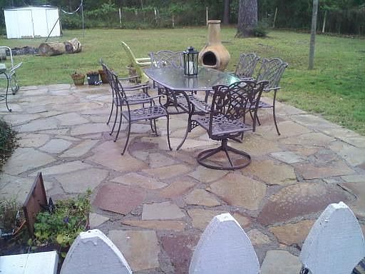 Stone Patio & fenced pet yard inside complete property fencing