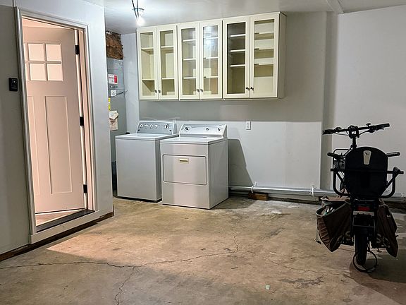 Washer/dryer + extra storage in the garage