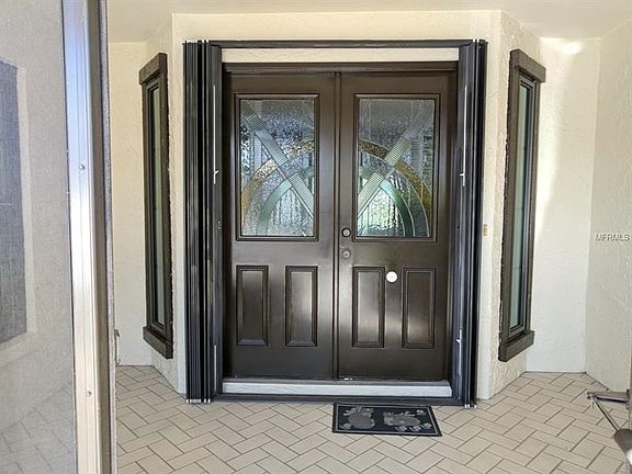 Front entry doors with Acordian Security panels