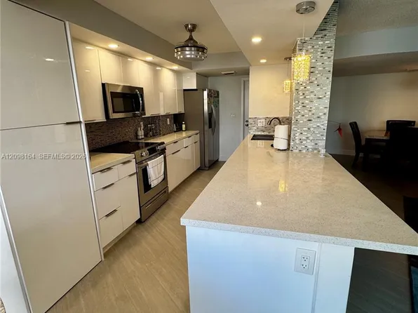 100 Golden Isles Dr APT 205, Hallandale, FL 33009