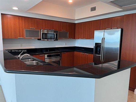 5th image of 14951 Royal Oaks Ln APT 2206