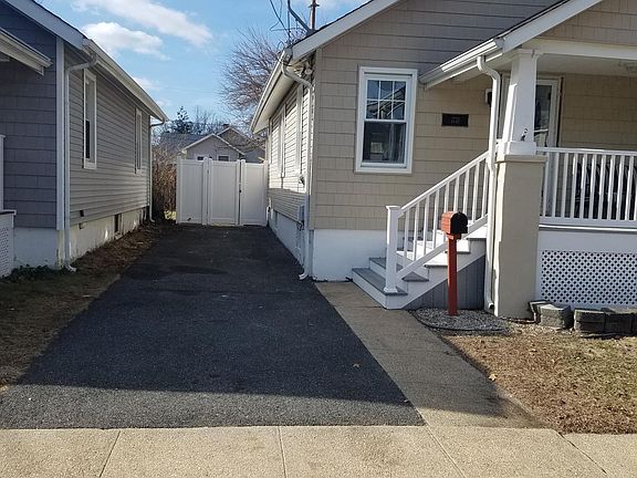 Driveway for 2 cars plus parking in front of house