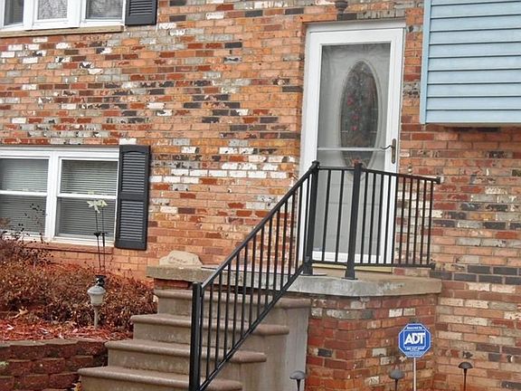 CLOSE UP OF BRICK AND FRONT DOOR