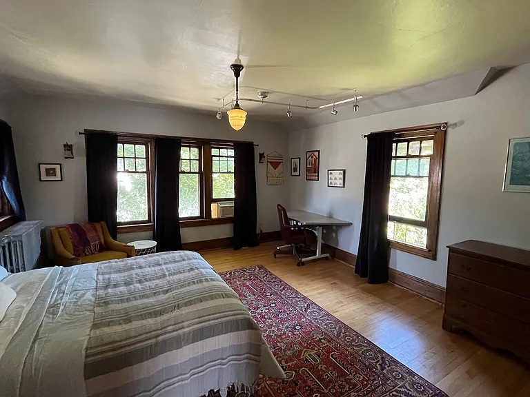 Windows on three walls provide plenty of sun but blackout curtains installed for night time