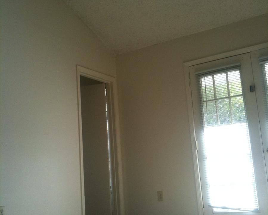 This is the Master Bd. It has frech doors overlooking a bal