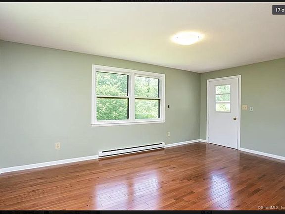 3rd bedroom with access to back deck