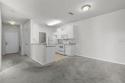 Entrance Kitchen Dining Area