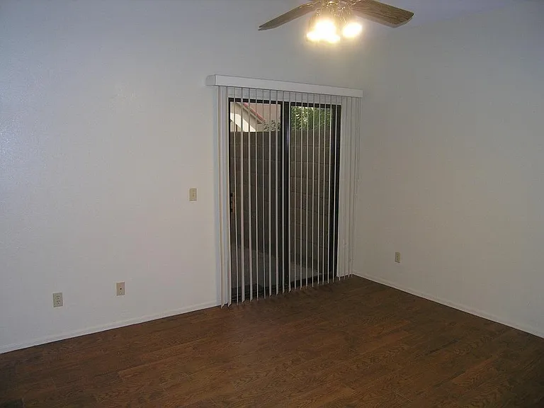 Master bedroom with arcadia doors to patio