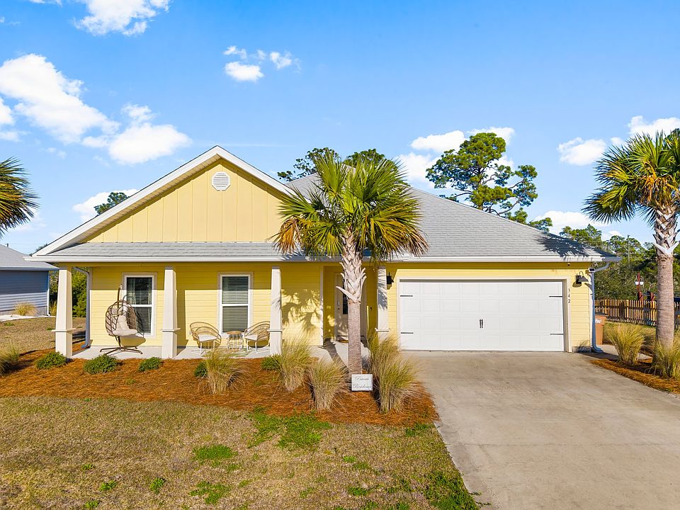 A warm welcome with a cozy front porch to relax and unwind!