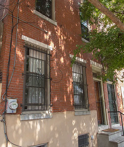 Front of house. Looks out towards UofPenn and Presbyterian Hospital Across the street one on Powelton Ave.