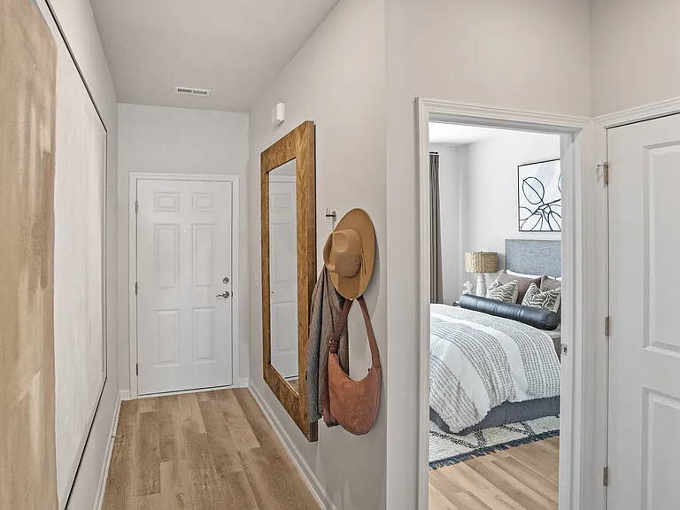 Entrance to the Richmond layout, looking at the front door and a peek into one of the guest bedrooms.