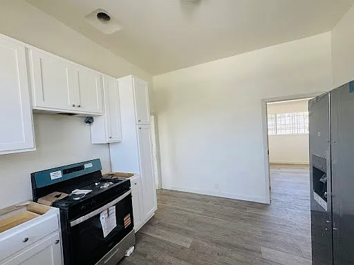 Remodeled 3 Bed, 2 Bath Home w/ Primary Suite & Huge Gated Parking — Photo 3