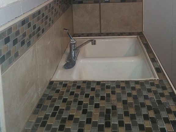 Kitchen with glass tlie