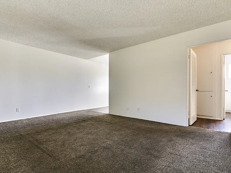 Living room with carpeted flooring