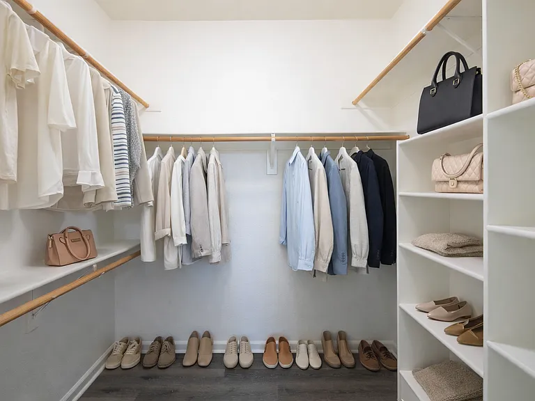 Spacious closets with built in storage for shoes, purses, & more!