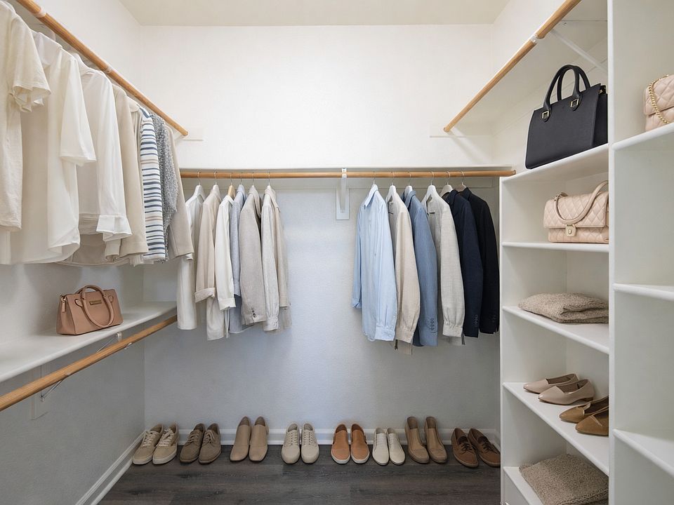Spacious closets with built in storage for shoes, purses, & more!