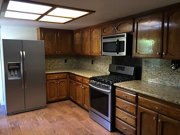 Kitchen with granite and new tile