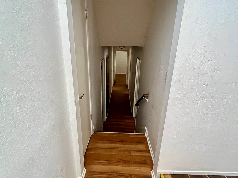 Hallway that leads to the bedrooms