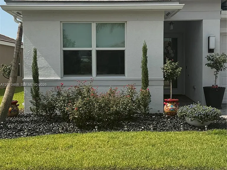 13542 SW Oceanus Blvd — Photo 1
