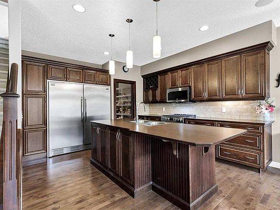 5th image of 103 W Tuscany Estates Cres NW