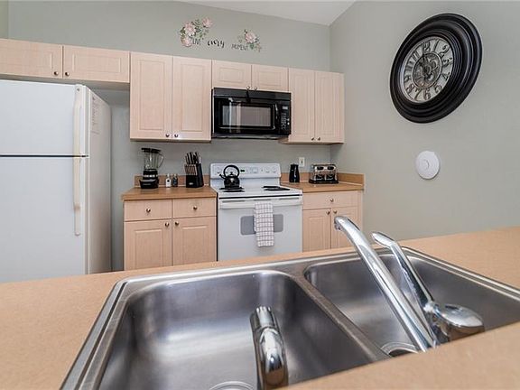 4th image of 2300 Butterfly Palm Way APT 304