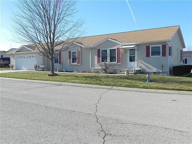1st image of 1004 NE White Oaks Ln