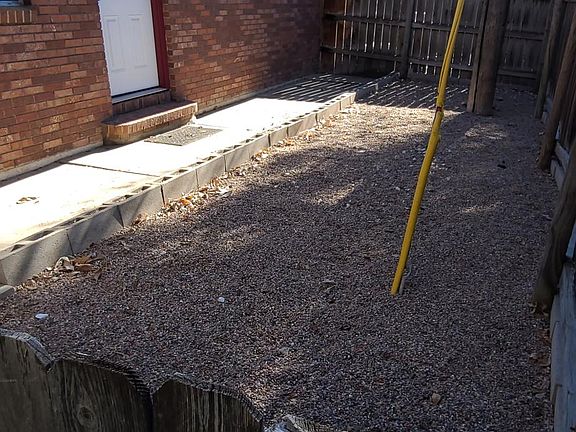 Small fenced private yard
