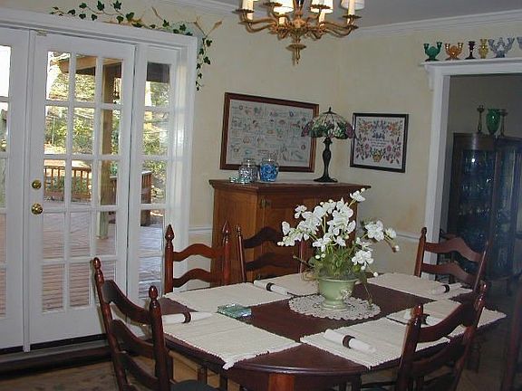Dining room with doors to deck