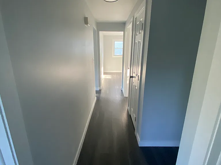 Hallway from front & middle bedroom