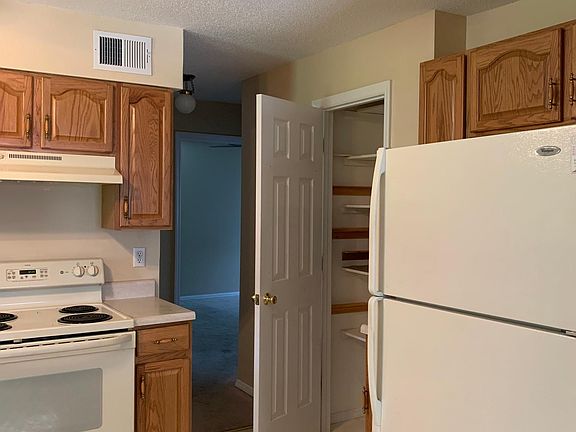 Kitchen has large pantry