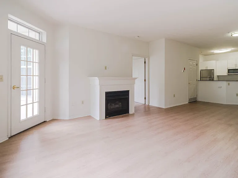 Living Room with Fireplace and Balcony