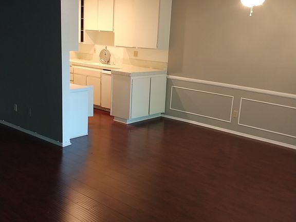 standing in livingroom looking at kitchen entry