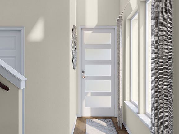 Foyer Looking into Great Room with Laminate Wood Flooring