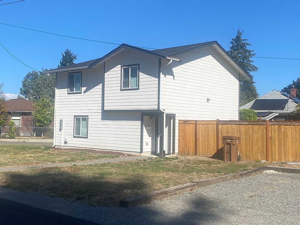 This three bedroom/2 bath home is new condition and has a fenced yard and large one car garage with alley access. Faces south.