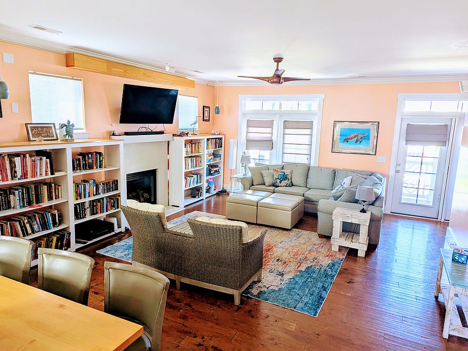 Open floor plan view of living room from kitchen