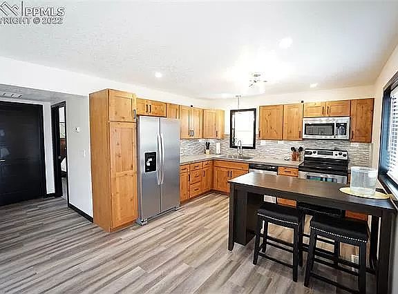 An example of what the kitchen looked like furnished with a dining table.