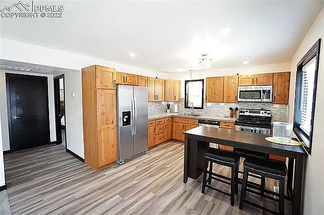 An example of what the kitchen looked like furnished with a dining table.