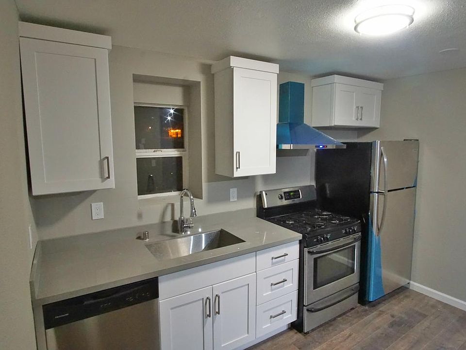 Please excuse the blue plastic on appliances! We are complet