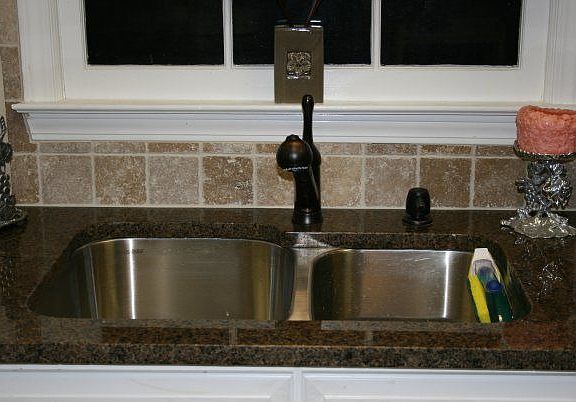 Undermount sink with new faucet