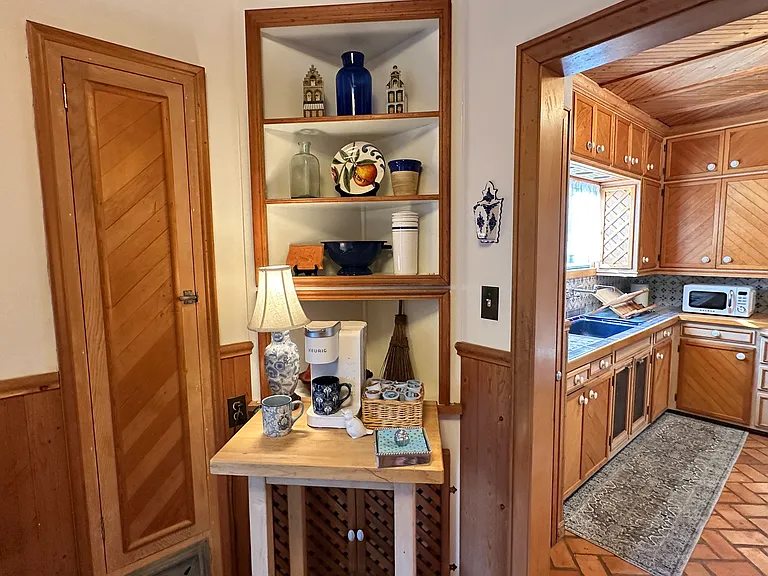 Built in Ironing board and kitchen storage
