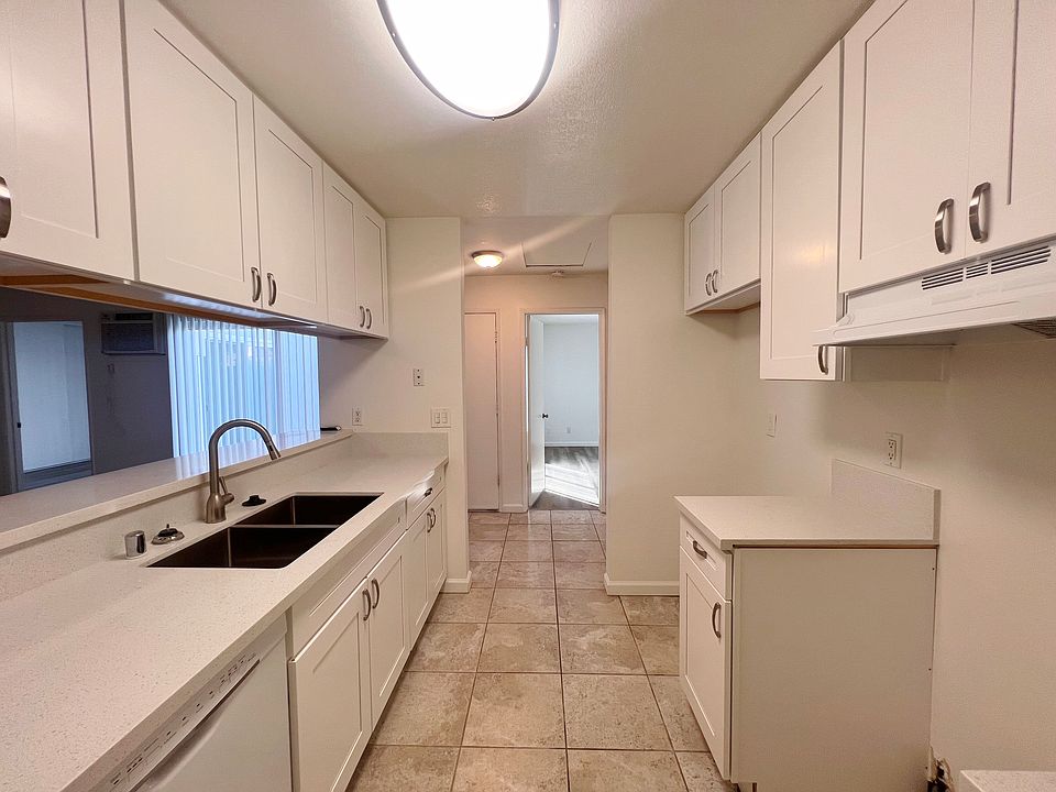 Kitchen; new stainless steel appliances have been installed (electric range, refrigerator and dishwasher).
