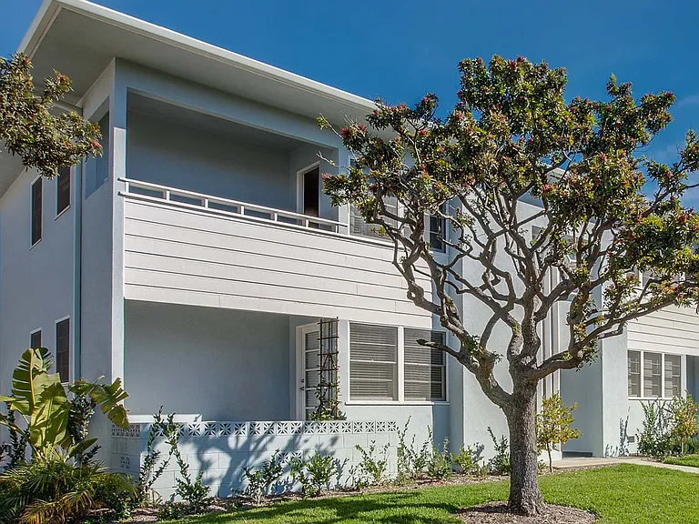 Classic 50s architecture on the outside with brand-new, modern interiors