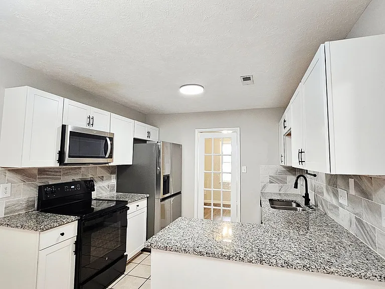 7490 Beverly Dr — Photo 11