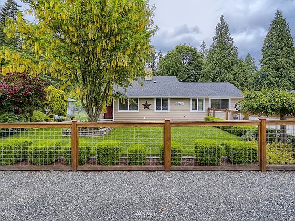 Backyard is home to the 3 car mechanic garage with oversized 3rd bay for boat - Has separate 200amp electrical service