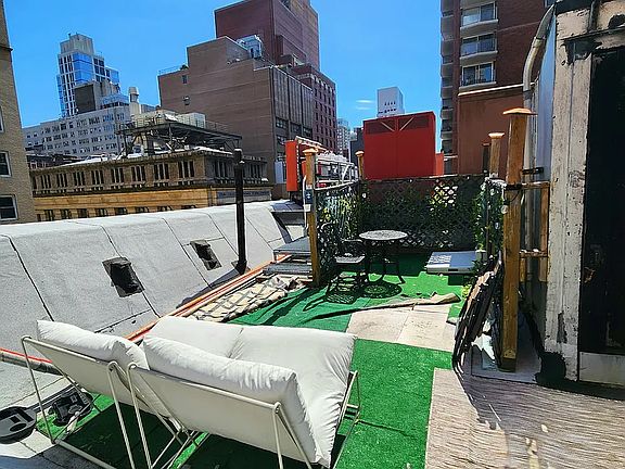 5th image of 137 E 35th St APT 4