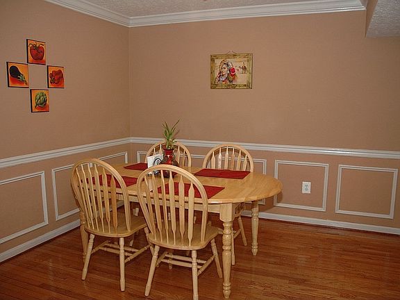 Separate dining room with hardwood floors